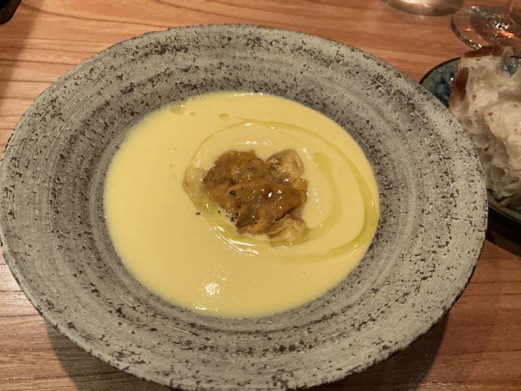 メラキのとうもろこしのズッパ 青森県産うに 生ハムのジュレ